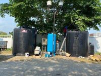 台南市府水利局在建築工地設砂濾淨水設備，淨水後可提供民生用水。圖╱水利局提供