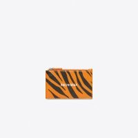 橘色虎紋零錢包，8,500元。圖╱BALENCIAGA提供
